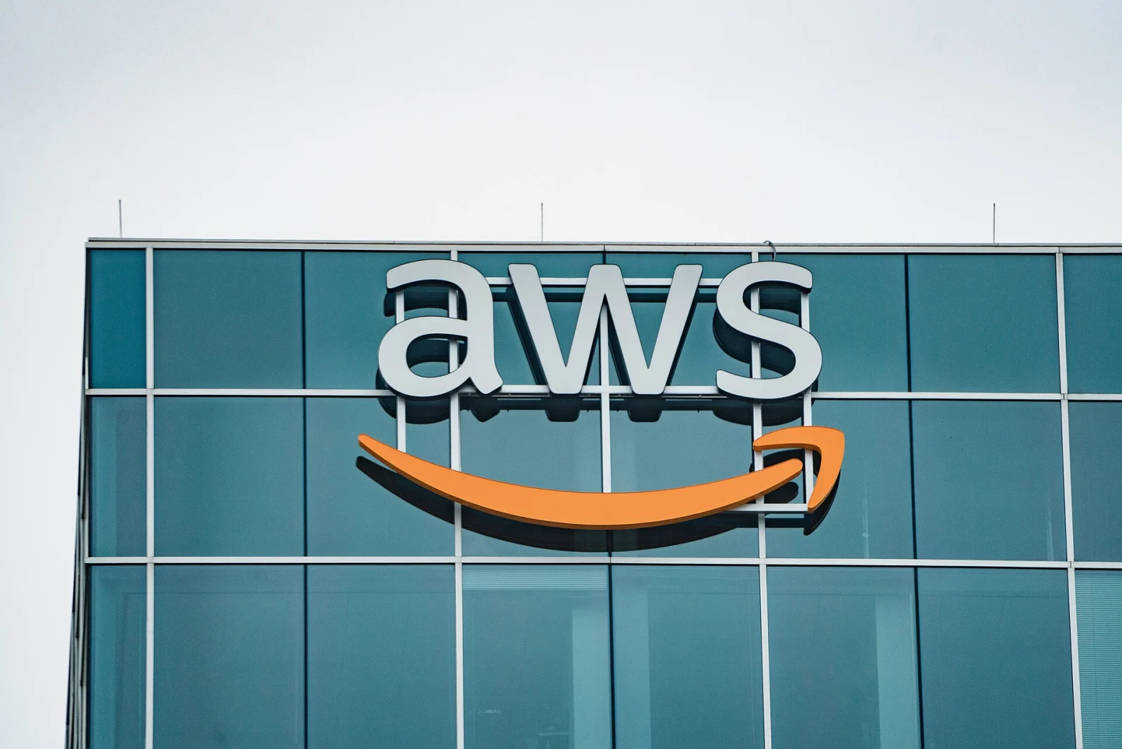 AWS signage on the exterior of an office building in Houston, Texas.